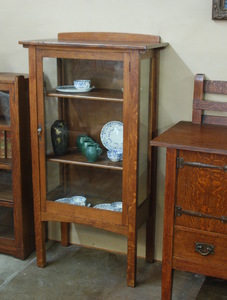 Charles Limbert Diminutive single door china display cabinet 